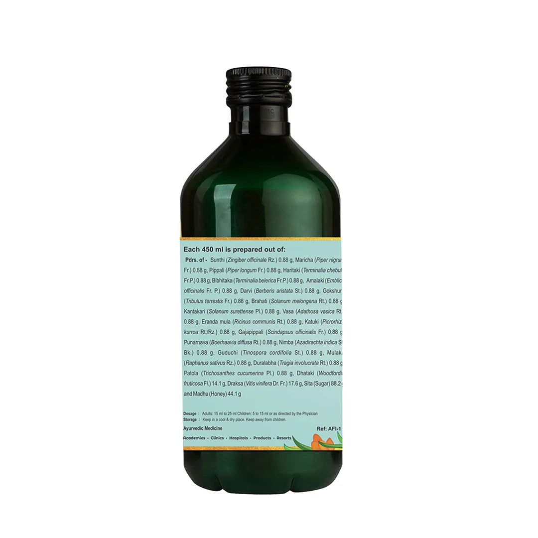 Rear view of Punarnavasava (punarnavasavam) bottle displaying the complete herbal ingredient list, dosage, and storage instructions for this traditional kidney tonic and fluid-balance tonic – Kerala Ayurveda India
