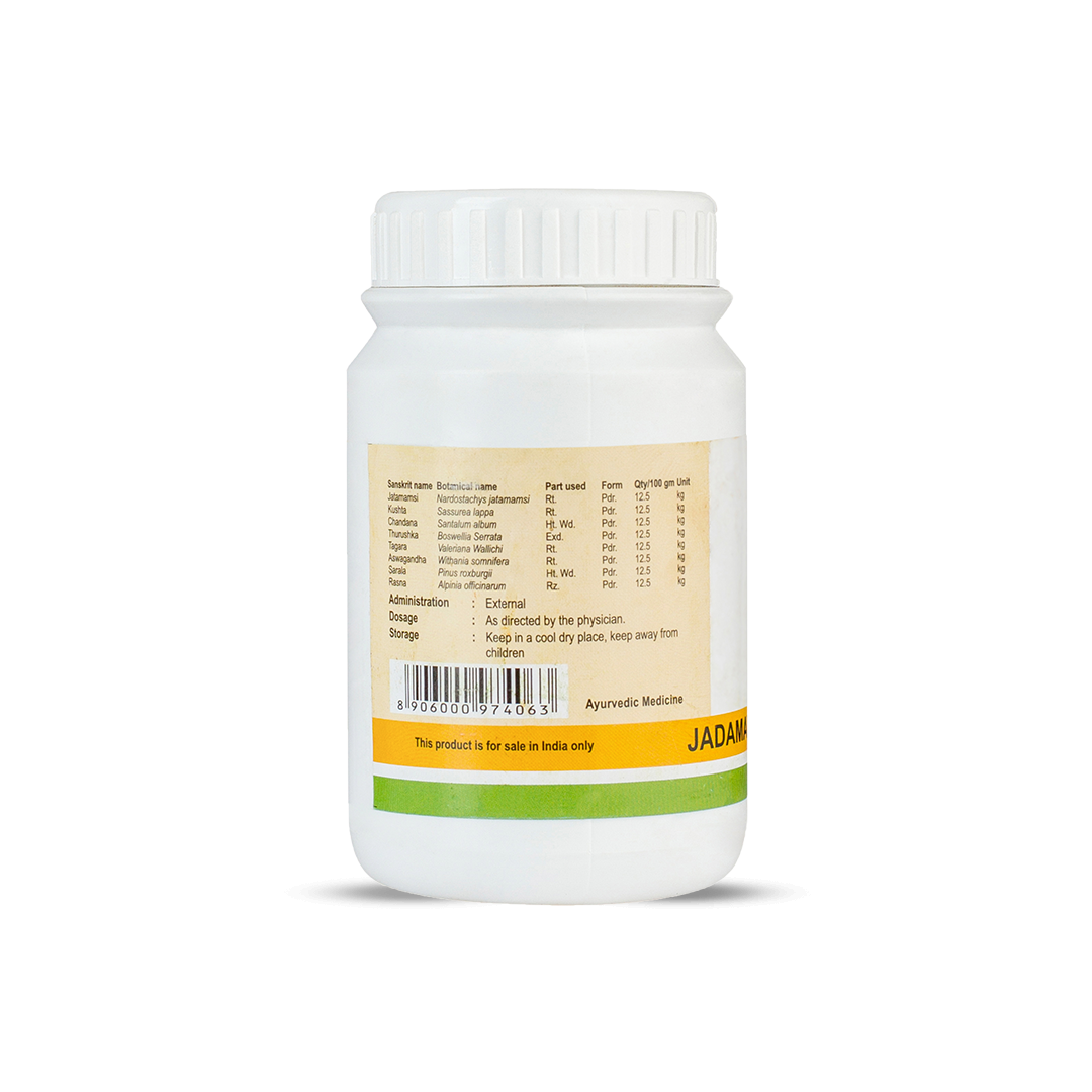 Side view of the Jadamayadi Choornam jar, showing a detailed table of ingredients, including Sanskrit name, botanical name, part used, form, and quantity per 100 gm. It also lists administration (External), dosage, and storage instructions. – Kerala Ayurveda India