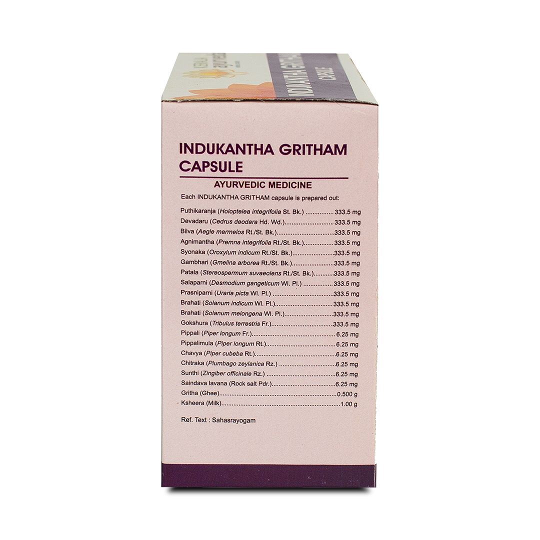 Side view of the Kerala Ayurveda Indukantha Gritham Capsule box, detailing the ingredients per capsule, including Putikaranja, Devadaru, Bilva, and other herbs, along with "AYURVEDIC MEDICINE" label. – Kerala Ayurveda India
