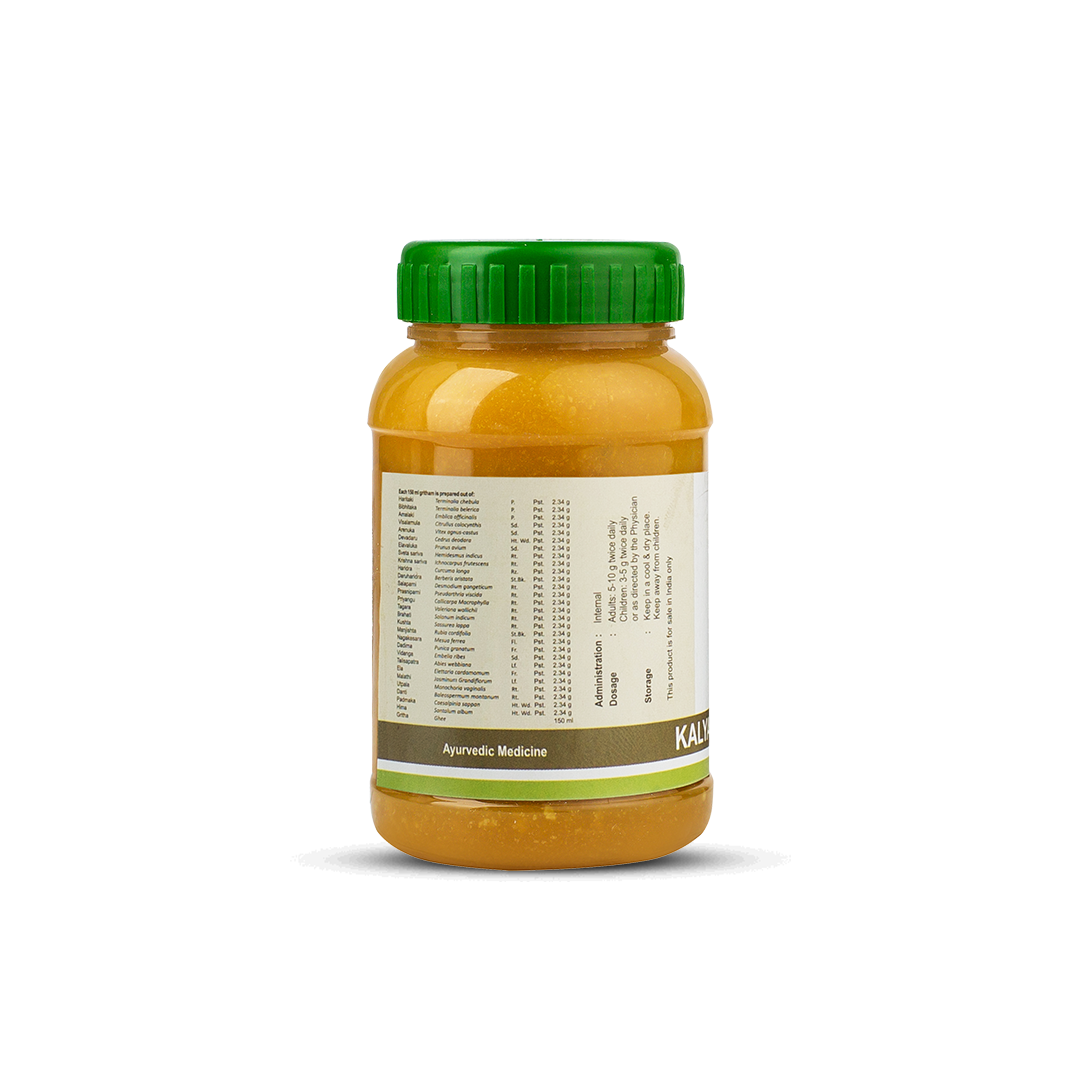 Side view of the Kalyanaka Ghritham jar, showing a detailed list of ingredients, administration instructions, dosage (1-2 teaspoons twice daily for adults), and storage guidelines. – Kerala Ayurveda India