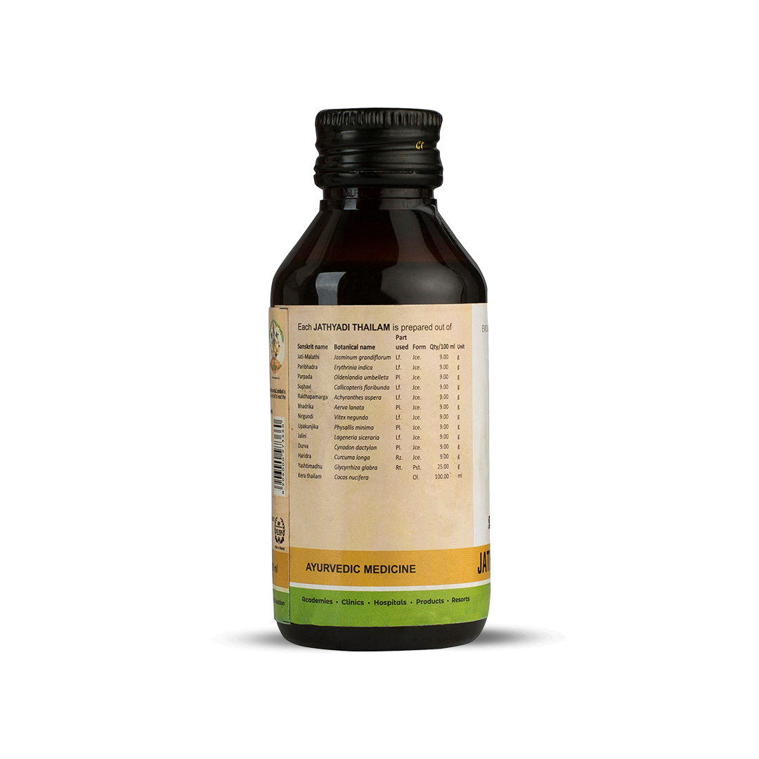 Side view of the dark brown glass bottle of Kerala Ayurveda Jathyadi Kera Thailam, showing a detailed list of ingredients prepared per 100 ml, and indicating it is an Ayurvedic medicine. – Kerala Ayurveda India