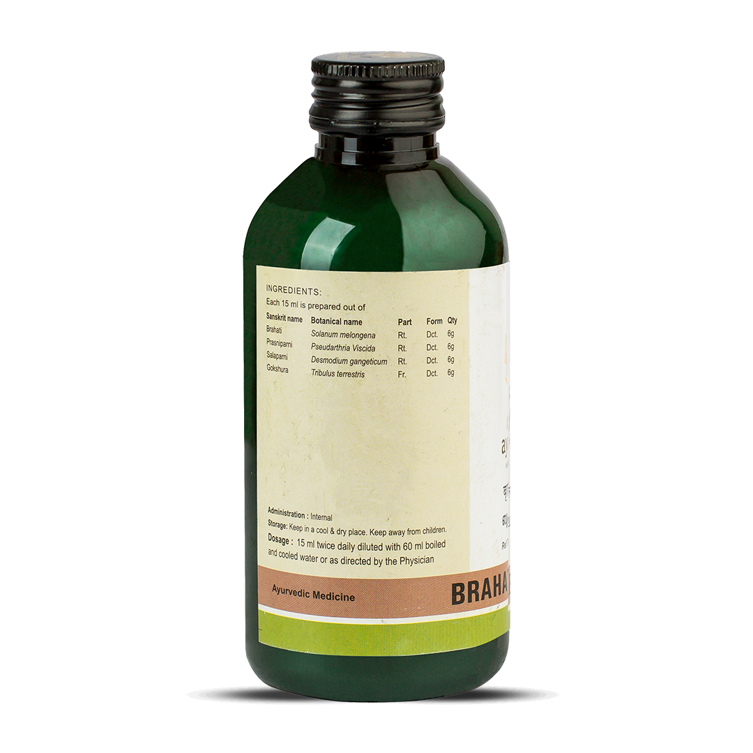 Side view of the dark green glass bottle of Kerala Ayurveda Brahatyadi Kwath, showing a detailed list of ingredients prepared per 15 ml, including Sanskrit name, botanical name, part, form, and quantity. Administration, dosage (15 ml twice daily diluted with 60 ml water), and storage instructions are also visible. – Kerala Ayurveda India