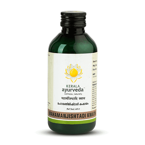 Front view of a dark green glass bottle of Kerala Ayurveda Mahamanjishtadi Kwath, with a cream-colored label displaying the product name in English and Malayalam script, along with the Kerala Ayurveda logo. – Kerala Ayurveda India