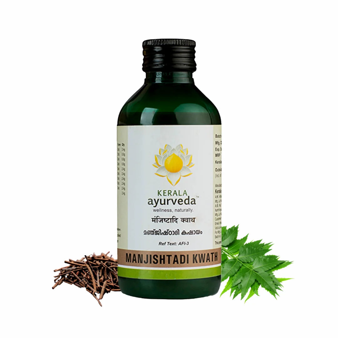 Front view of a dark green glass bottle of Kerala Ayurveda Manjishtadi Kwath, featuring the product name in English and Malayalam script, with illustrations of Manjishta roots and Neem leaves. – Kerala Ayurveda India