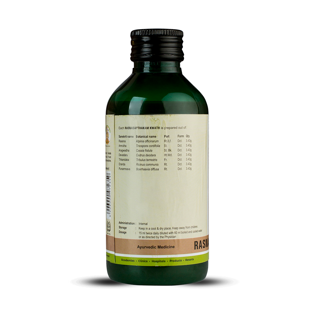 Side view of the dark green glass bottle of Kerala Ayurveda Rasnasapthakam Kwath, showing a detailed list of ingredients prepared per 15 ml, including Sanskrit name, botanical name, part, form, and quantity. Administration, dosage (15 ml twice daily diluted with 60 ml water), and storage instructions are also visible. – Kerala Ayurveda India
