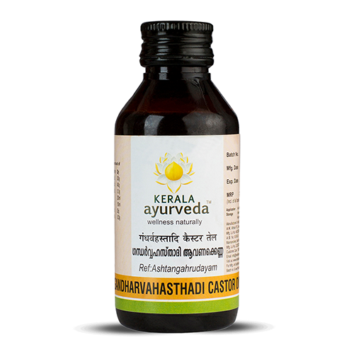 Front view of a dark brown glass bottle of Kerala Ayurveda Gandharvahastadi Castor Oil, with a cream-colored label displaying the product name in English and Malayalam script, along with the Kerala Ayurveda logo. – Kerala Ayurveda India