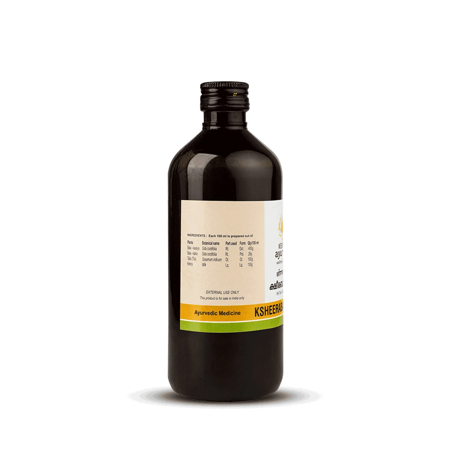 Side view of a 450ml dark brown glass bottle of Kerala Ayurveda Ksheerabala Thailam, showing a detailed list of ingredients prepared per 100 ml for external use. – Kerala Ayurveda India