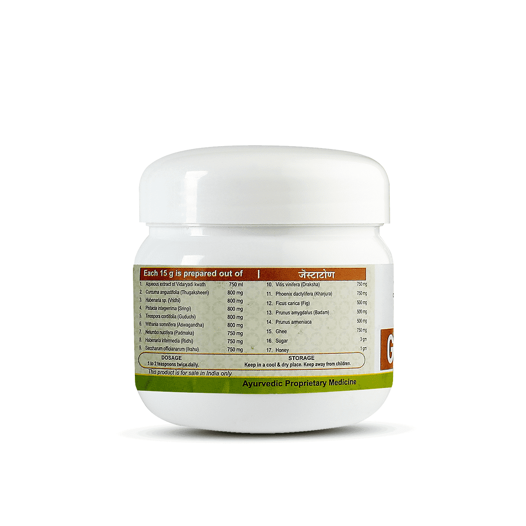 Side view of the Gestatone Lehyam jar, showing a detailed list of ingredients prepared per 15g, including aqueous extract of Vidaryadi Kwatha, Rubia cordifolia, Withania somnifera, along with dosage (1-2 teaspoons twice daily) and storage instructions. – Kerala Ayurveda India