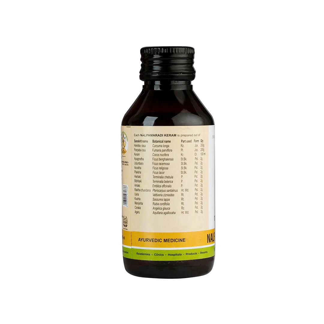 Back view of Nalpamaradi Keram 100 ml amber bottle displaying full ingredient and usage label – Kerala Ayurveda India